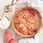 Mahlab Palisade Peach Tart with Cardamom Whipped Cream