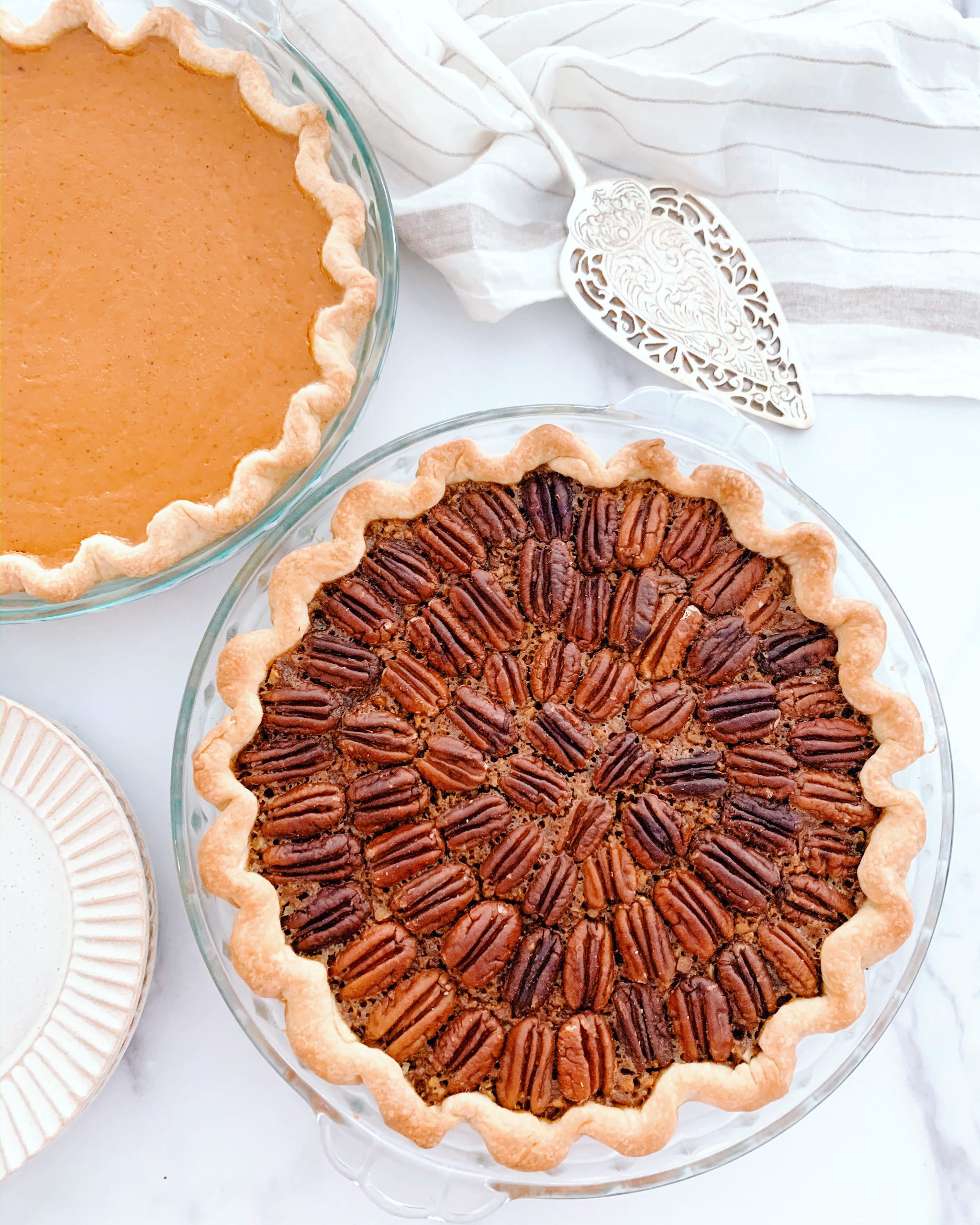 https://theeleganteconomist.com/wp-content/uploads/2019/11/Date-Syrup-Pecan-Pie-Recipe-scaled.jpeg